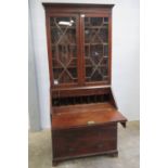 A late Georgian bureau bookcase,