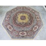 A contemporary yellow ground rug having geometric floral decoration, 200cm dia.