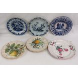 A Delft circular dish, 22cm diameter, two French maiolica plates and a jug, and others, seven items.