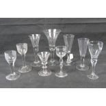 A quantity of assorted footed glassware, together with two single spiral stem glasses,