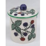 A W.H. Goss preserve jar and cover with blackberry decoration, 10cm high.