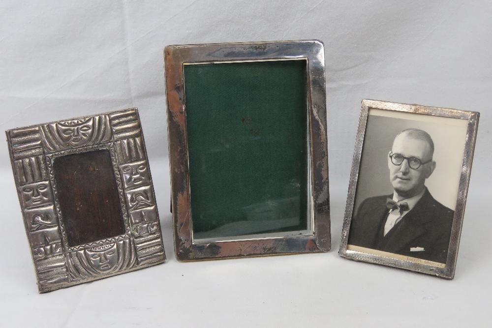 Two HM silver photograph frames, both slightly a/f,