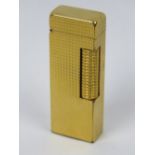 A vintage Dunhill 'Rollagas' gold plated lighter c1970-80's,