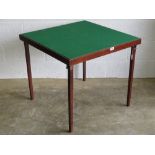 A contemporary square shaped games/card table by petra with spring loaded folding legs, 76 x 76cm,