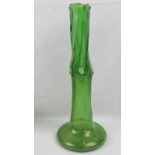 A tall green glass planter vase having open apertures of foliate form to the stem, 44cm high.