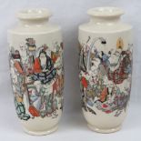 A pair of Oriental crackle glazed cylindrical vases hand painted with numerous recreational figures