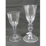 A stout baluster stemmed glass having large hollow foot, 22cm high,