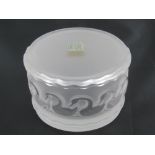 A contemporary Lalique lidded powder pot decorated with swans upon, 10cm dia.