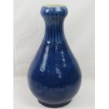 A Chinese tapered ovoid vase with bulbous neck,