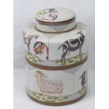 A modern Chinese crackle glaze cylindrical jar and cover decorated with goats, 33cm high,