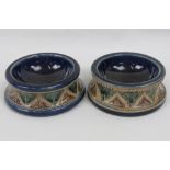 A pair of Bailey Fulham stoneware salts in blue, brown and green glaze, impressed marks,