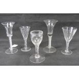 A quantity of five assorted fine quality antique air twist stem glasses, 19cm,