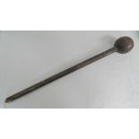 An early 20th century tribal knobkerry having foliate carved ball, all measuring 60cm in length.