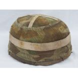 A rare WWII German M38 Fallschirmjager 'Paratrooper' jump helmet having Splinter camo helmet cover