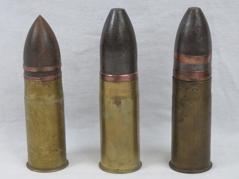 Three inert German Naval 37mm Pom Pom cannon rounds, with unfired high explosive projectiles,