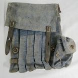 A WWII German MP40 Luftwaffe issue magazine pouch in blue fabric having magazine loader pouch