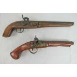 A pair of decorative hammer lock percussion cap and ball pistols.