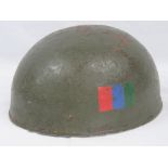 A British Paratrooper helmet with Regimental side decal, chin strap and padded liner, size 7 1/2,