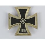 A WWII German Iron Cross 1st class badge.