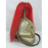 A Victorian Royal Dragoon Guards helmet bearing the number 1 to the shako plate,