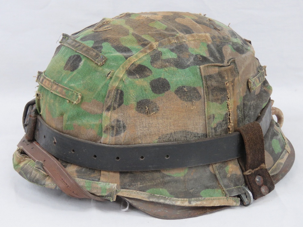 A WWII German M35 Infantry helmet with Dot camo cover, - Image 2 of 5