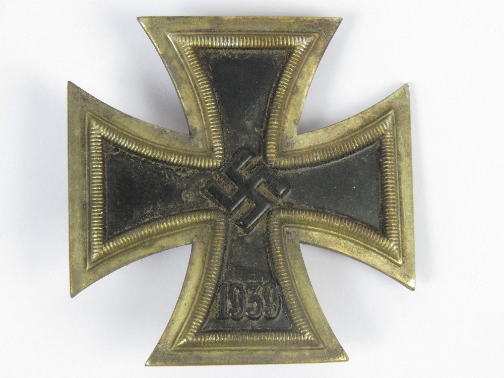 A WWII German Iron Cross 1st class badge dated 1939 with '20' marked to pin.