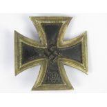 A WWII German Iron Cross 1st class badge dated 1939 with '20' marked to pin.