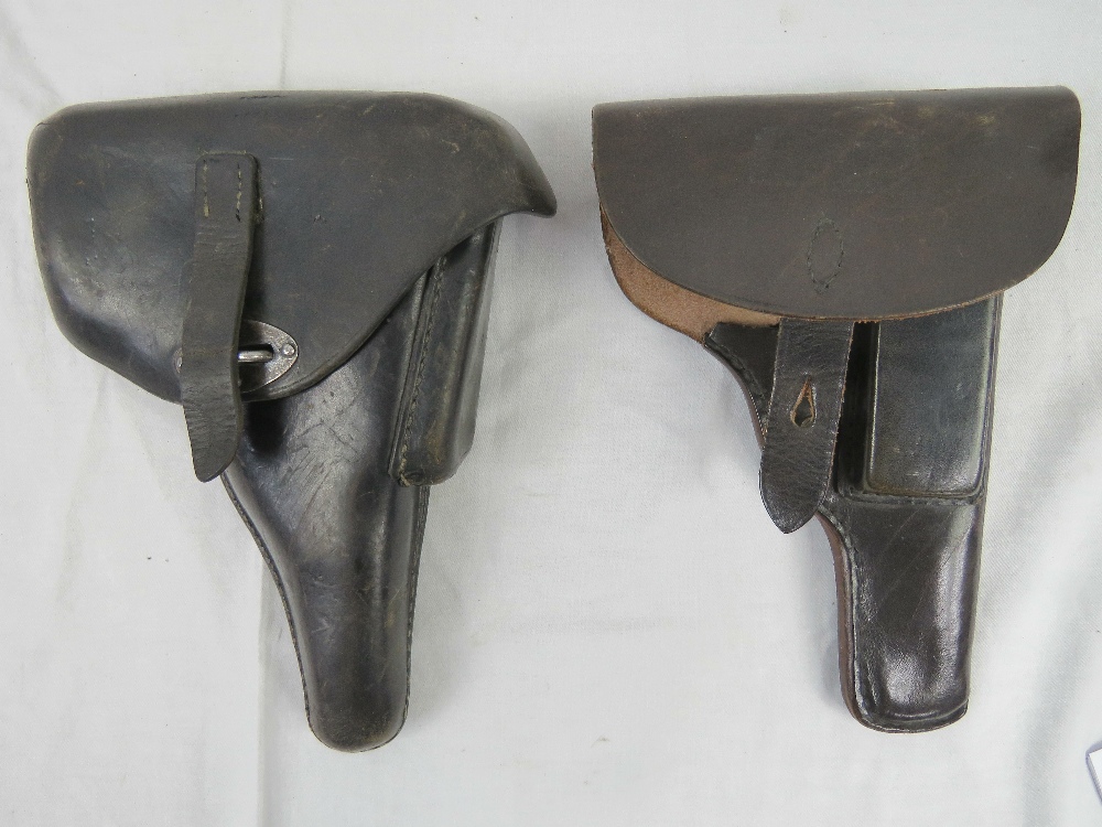 A pair of WWII German Officers Walther P38 pistol holsters;