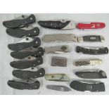 Nineteen lock knives including; Winchester, Victorinox, Harley Davidson, Boker and Spyderco.