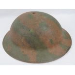 A WWI British Military issue Brodie helmet worn by Infantrymen,