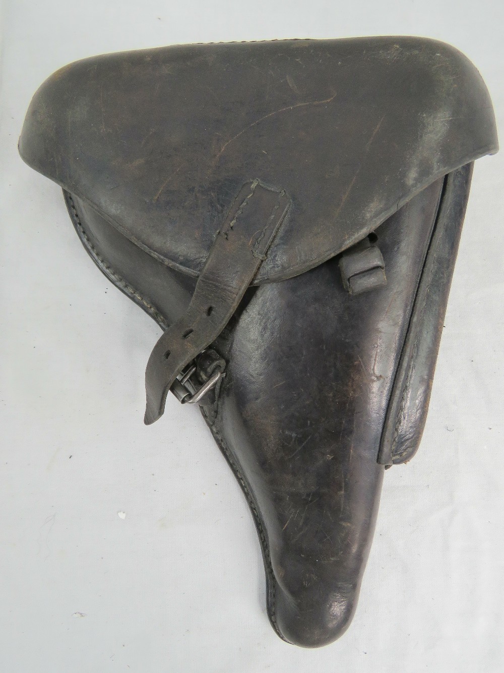 A WWII German Military Officers black leather holster for the Luger P08 pistol,