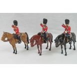 Three Britains toy soldier figurines bei