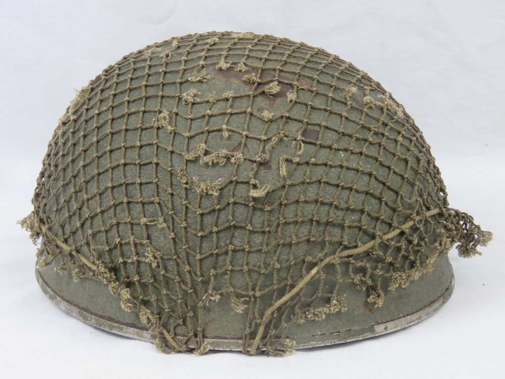 A WWII British Paratroopers helmet with