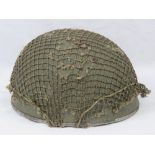 A WWII British Paratroopers helmet with