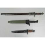 Three reproduction WWII bayonets; M1 Gar