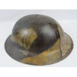 A WWI British Military Brodie helmet wit