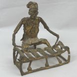 A good cast brass ethnic figurine of a s