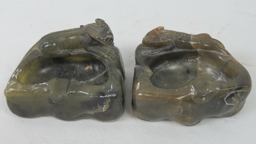 Two carved Chinese green jade ash receiv