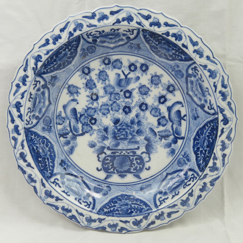 A Chinese blue and white circular dish w