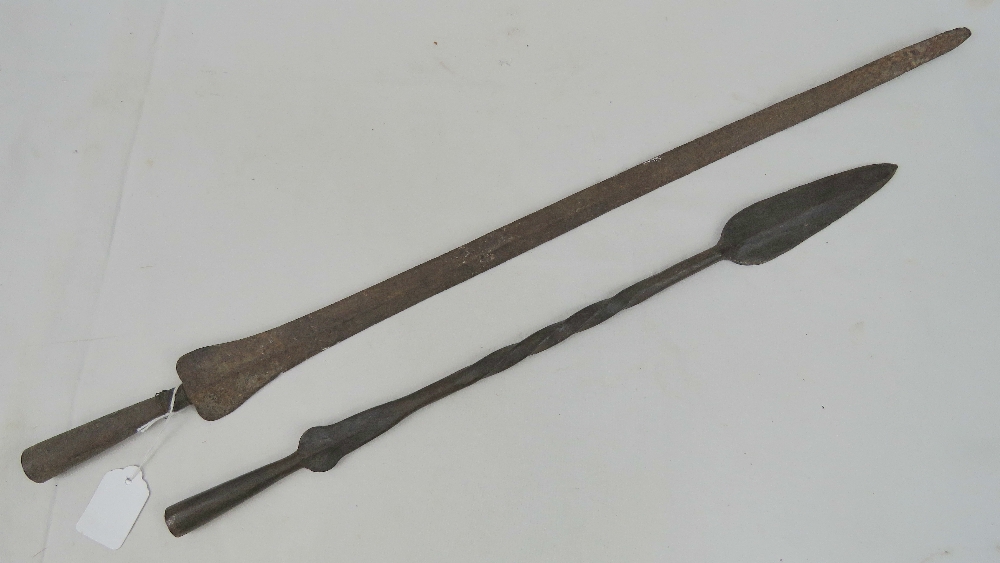 Two iron spear heads measuring 54cm and