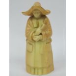 A Royal Worcester candle snuffer in the