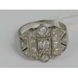 An impressive Art Deco diamond geometric cocktail ring having round brilliant in square shaped