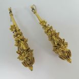 A pair of yellow metal large teardrop shaped earrings having applied filigree to front and base,