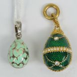 A silver and enamel egg pendant or charm, marked 925 and measuring 3cm inc loop.