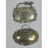 Two HM silver decanter labels being Whiskey and Brandy,