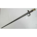 A 1880 Lebel bayonet complete with original scabbard (matching numbers) and curved quillion,