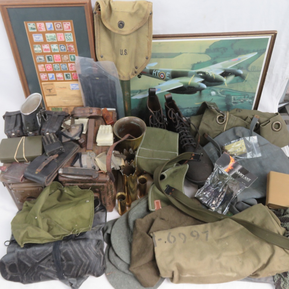 A quantity of assorted items of military interest including; ammo cans, tools,