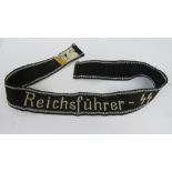 A Waffen SS enlisted mans cuff title 'Reichfuhrer SS' division, having RZM paper label verso,