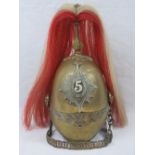 A Dragoon Guards 19th century brass helmet bearing the number 5 to the shako plate,