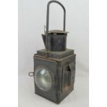A vintage enclosed magnified gas lamp as used in military ammunition stores / cargo holds on ships/